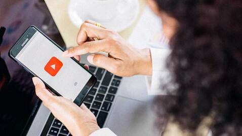 Woman Watching YouTube on Mobile